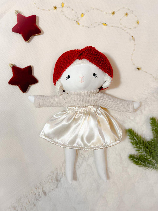 Bárány lány kötött fejpánttal és masnival