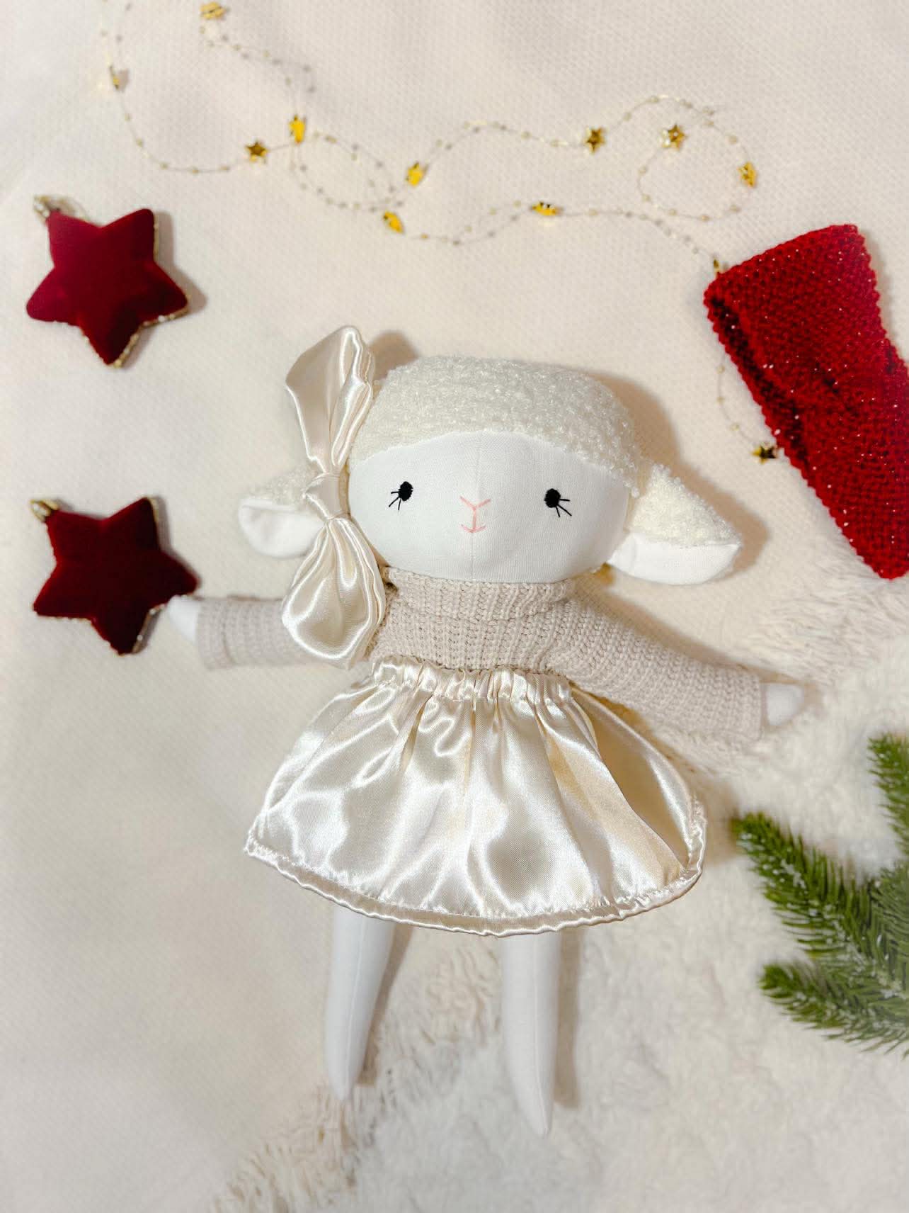 Bárány lány kötött fejpánttal és masnival